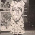 Jenette Moore standing in front of the Temple Theater - 1938